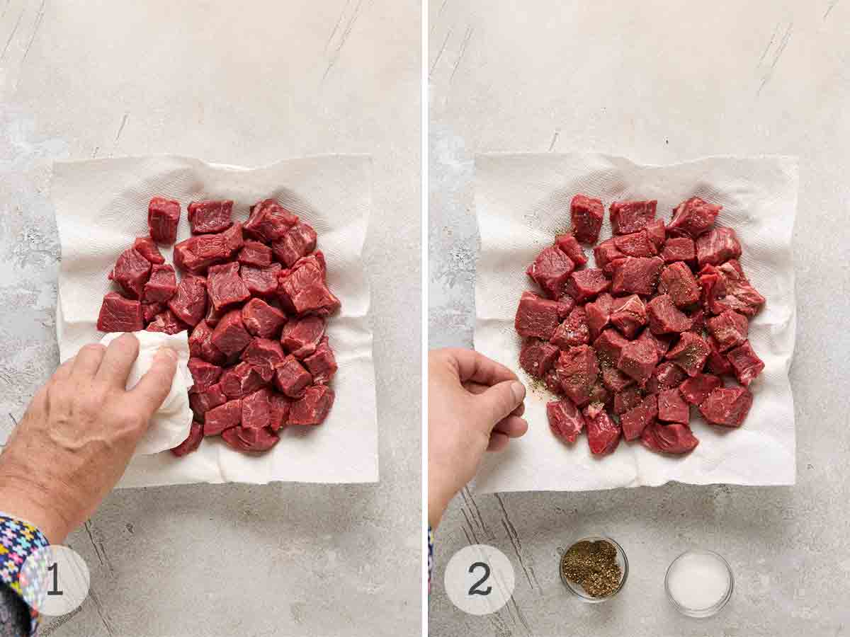 A person patting beef cubes dry; a person sprinkling salt and pepper over beef cubes.