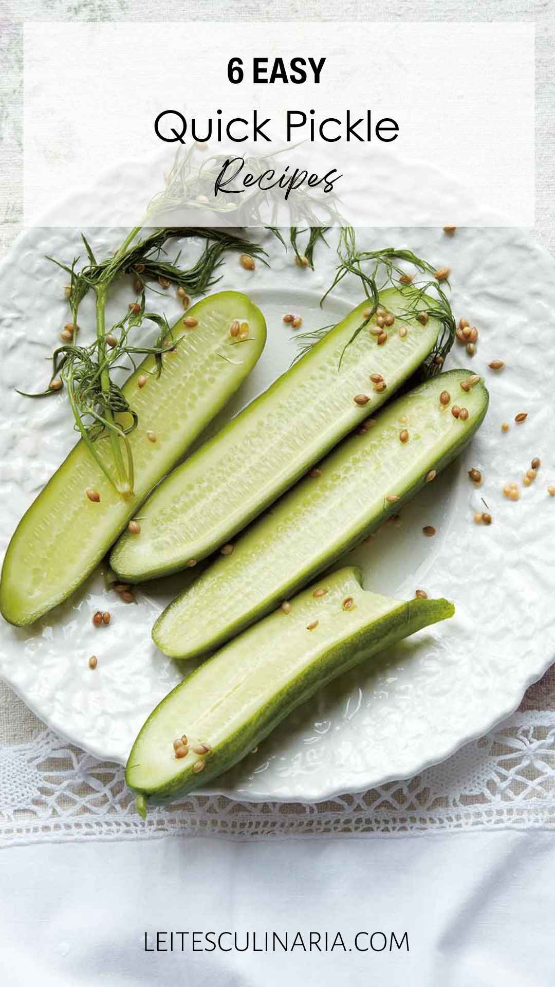 Four dill pickles on a plate.
