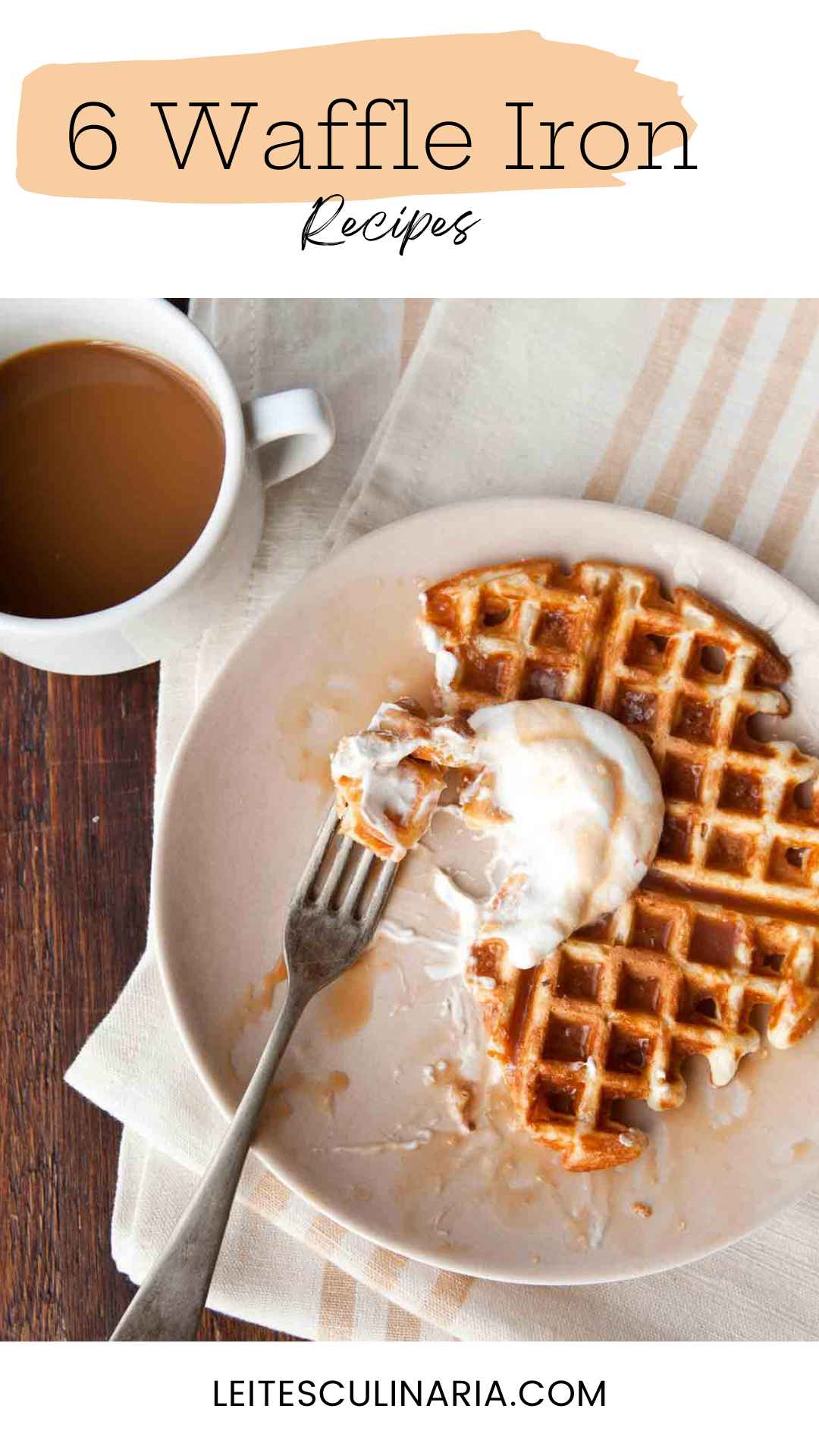 A partially eaten waffle topped with whipped cream and caramel sauce.