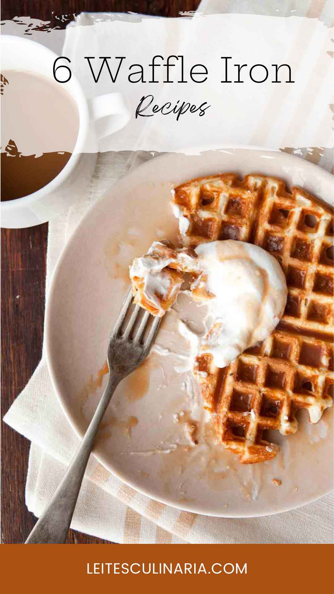 A partially eaten waffle topped with whipped cream and caramel sauce.