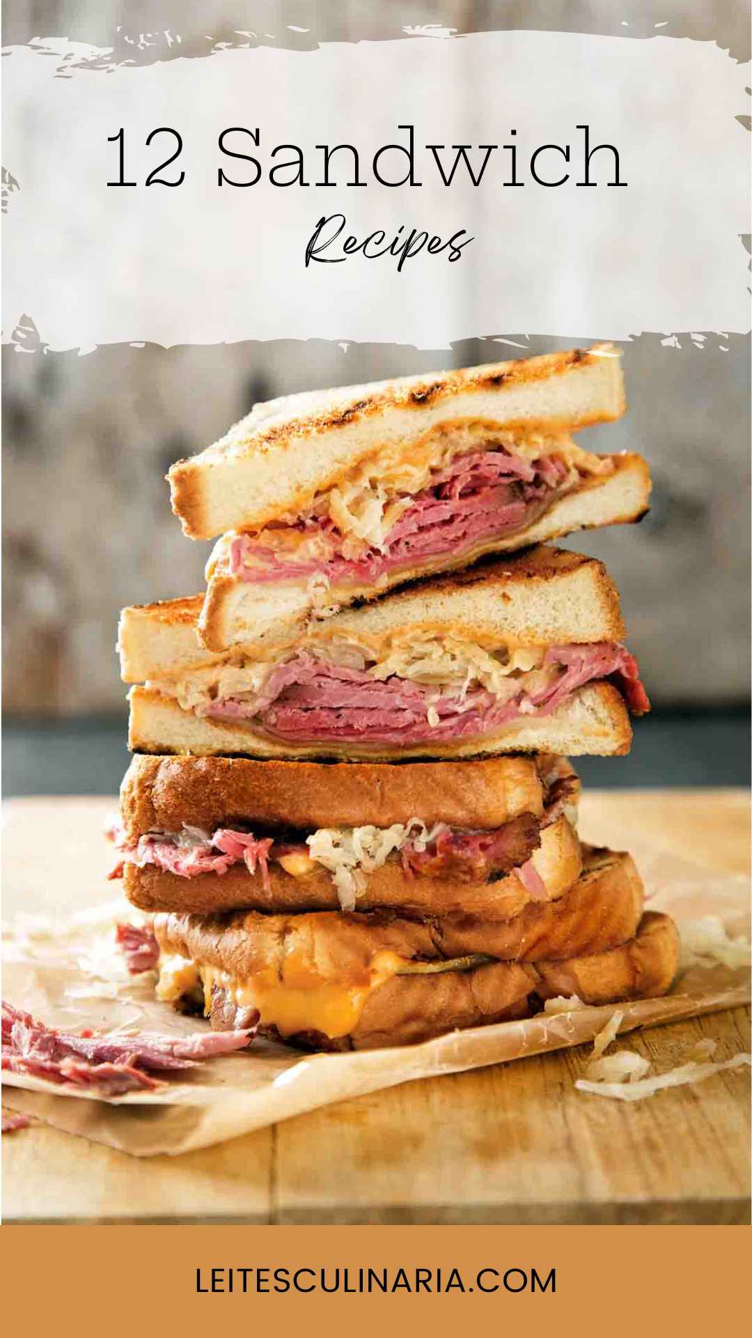 Quartered sections of a reuben sandwich stacked on top of each other on a wooden cutting board.