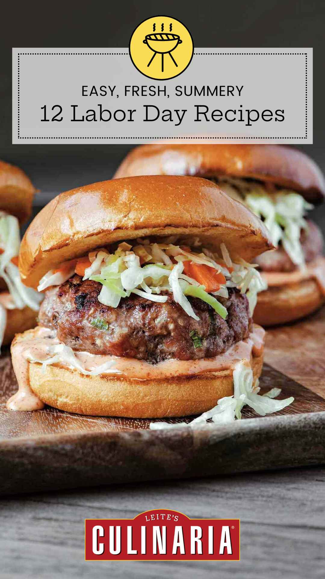 Two grilled pork burgers topped with coleslaw.