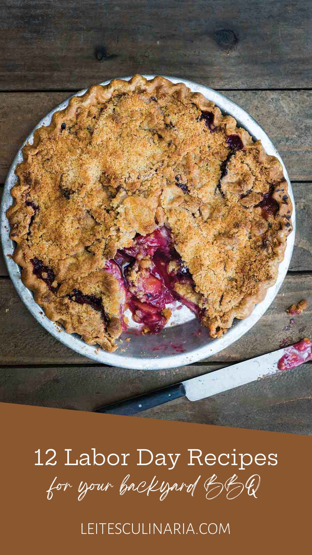 A plum pie with a serving missing from it.