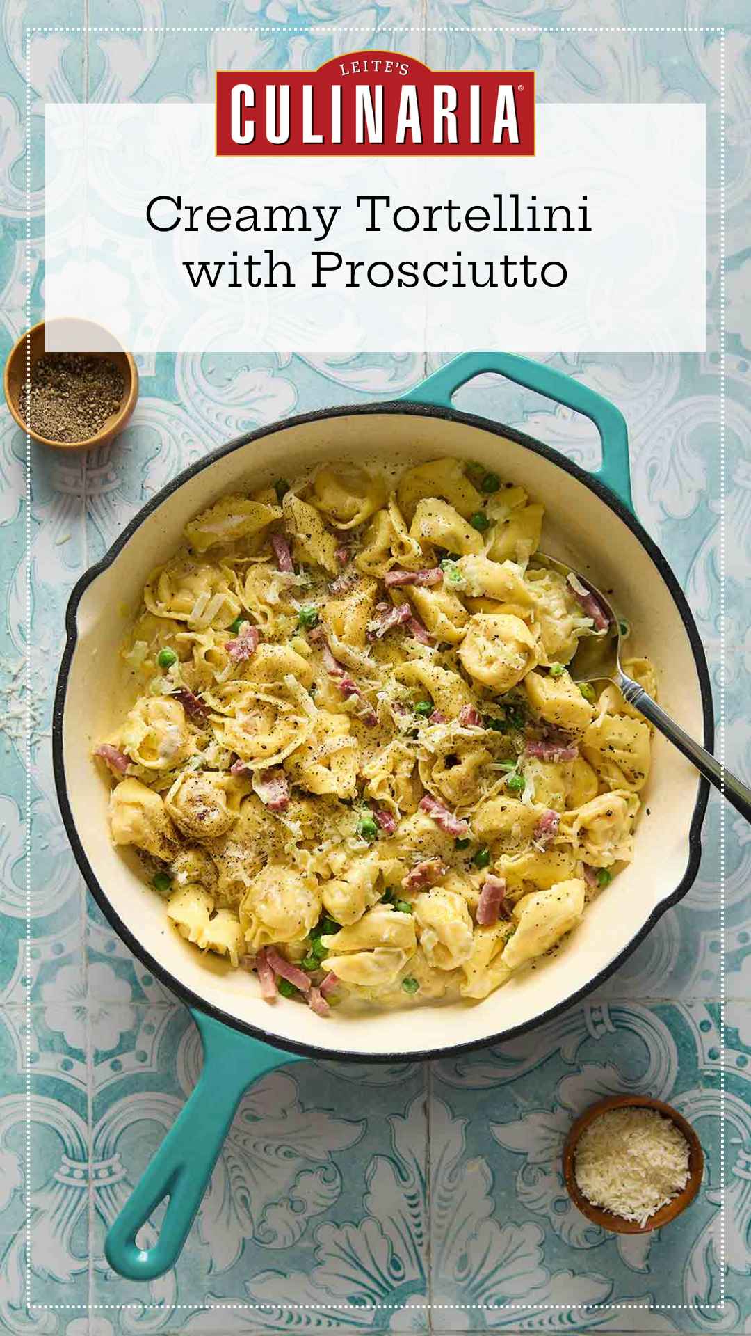 A deep skillet filled with tortellini with peas and prosciutto with bowls of pepper and cheese on the side.