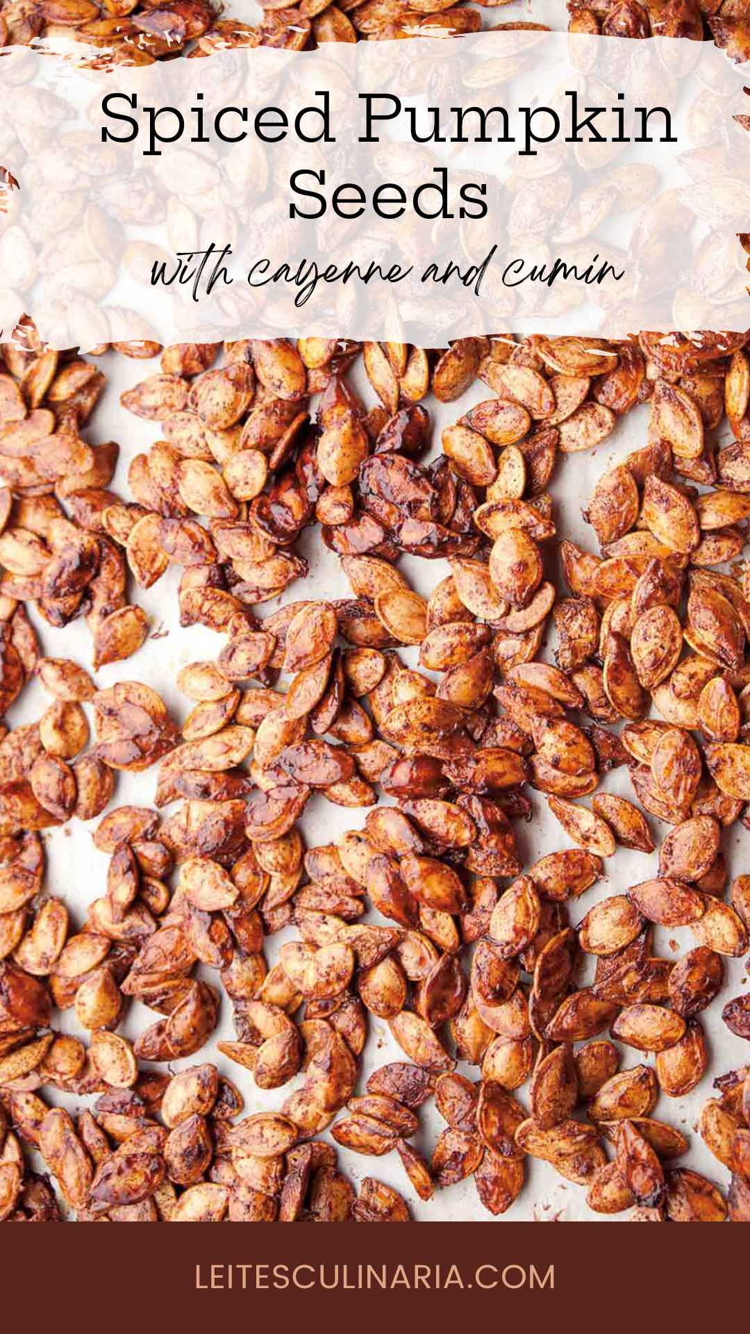 Pumpkin seeds, roasted with spices, spread on a white surface