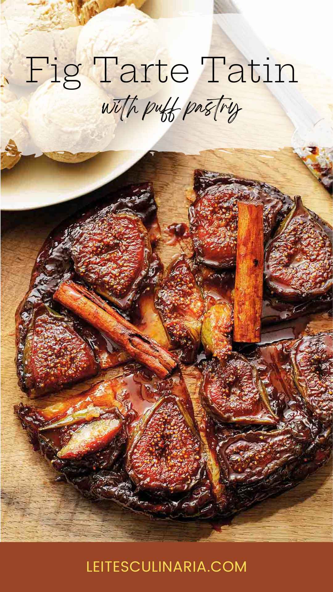 A whole fig tarte tatin topped with whole cinnamon sticks and cut into several pieces.