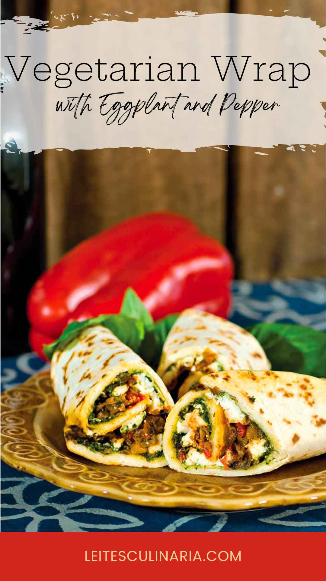 Three Mediterranean eggplant wraps on a plate with a whole red pepper in the background.