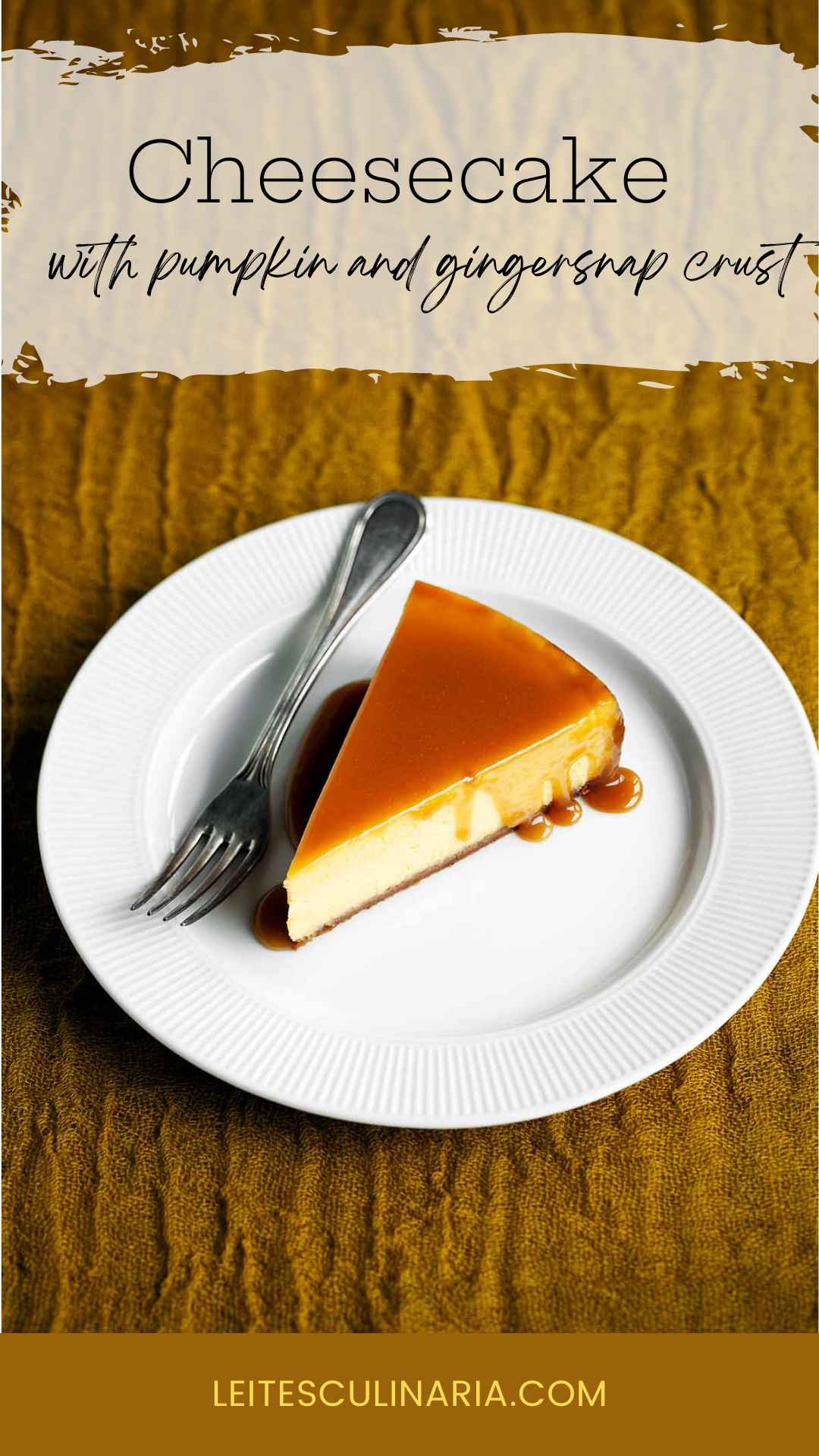 A slice of pumpkin cheesecake with caramel glaze drizzled over the top on a white plate with a fork on the side.