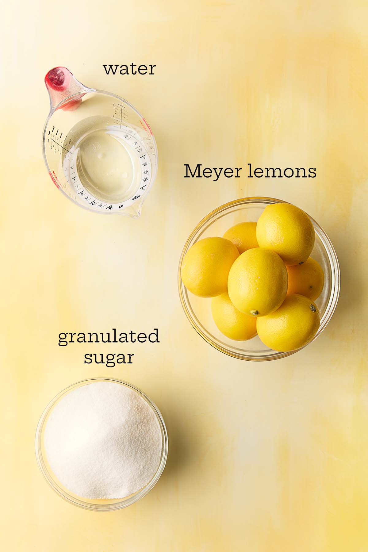 Ingredients for Meyer lemon marmalade--Meyer lemons, granulated sugar, and water.