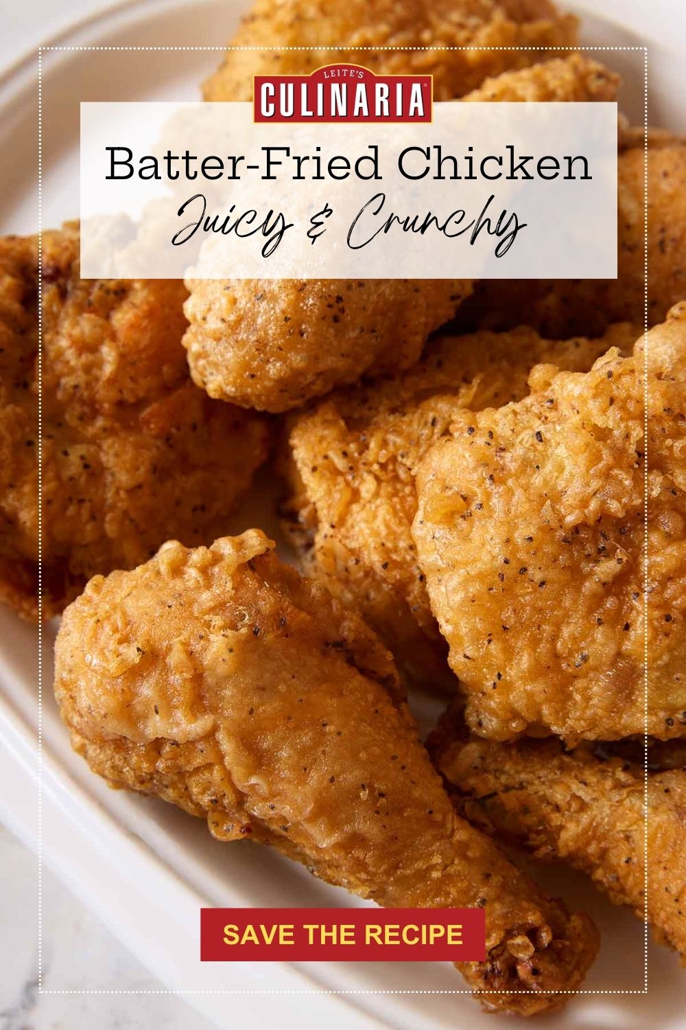 A plate of golden, crunchy batter-fried chicken with a crisp, seasoned crust.