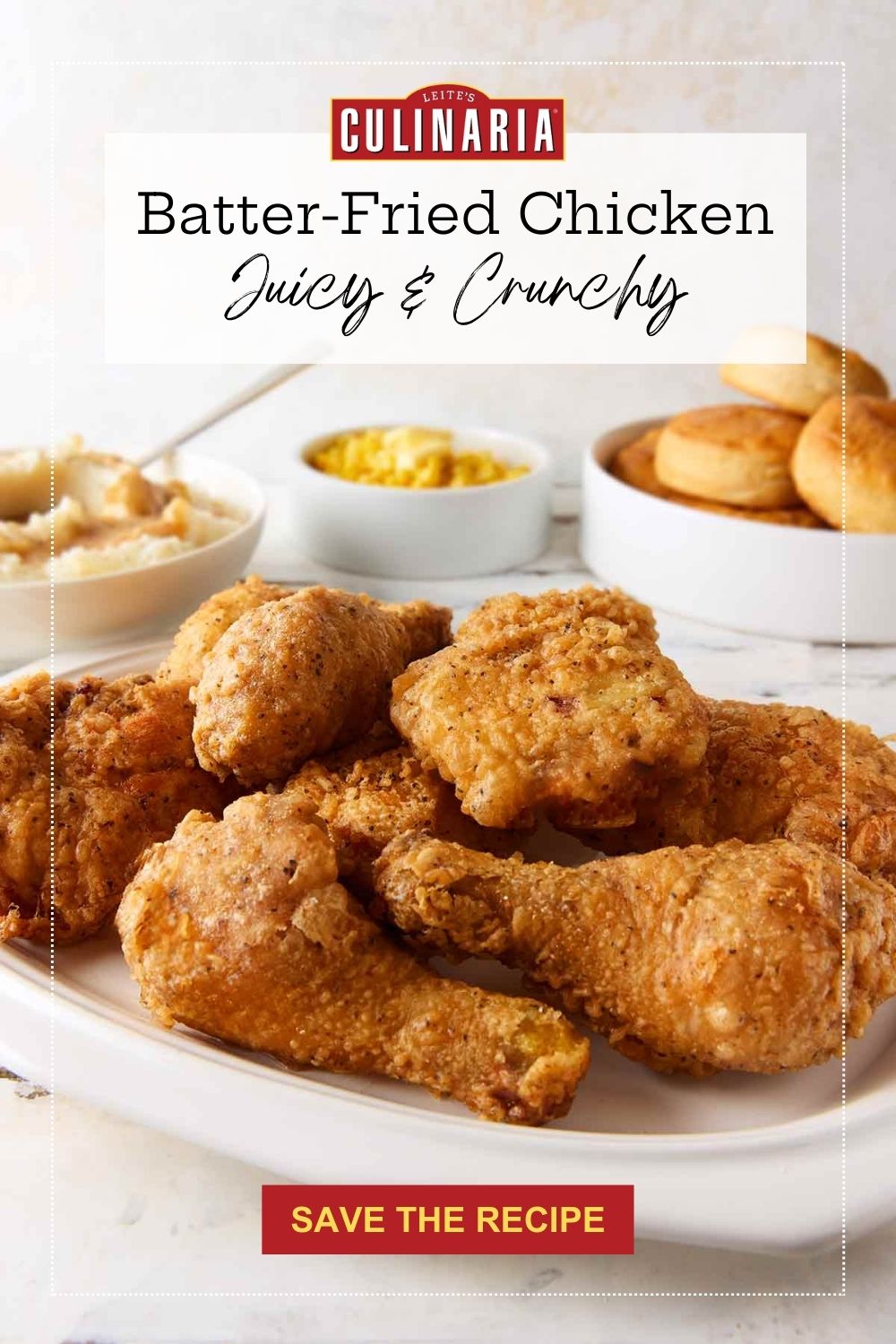 Close-up of crunchy, golden fried chicken drumsticks on a serving platter.