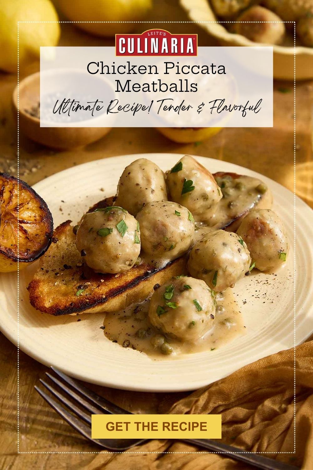 Close-up of chicken piccata meatballs with lemon-caper sauce and grilled bread on a plate.