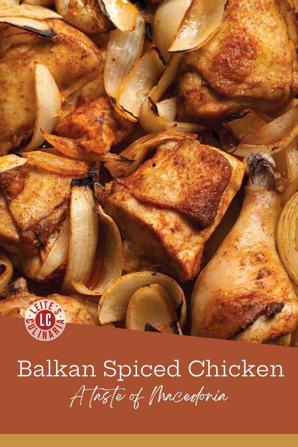 A rustic pan of traditional Balkan spiced chicken from Macedonia, featuring perfectly roasted chicken pieces and sweet onions.