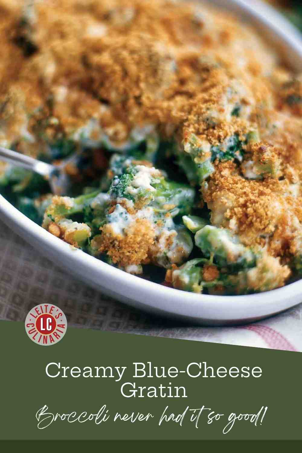 Spoon scooping a portion of creamy broccoli and blue cheese casserole topped with golden toasted bread crumbs.