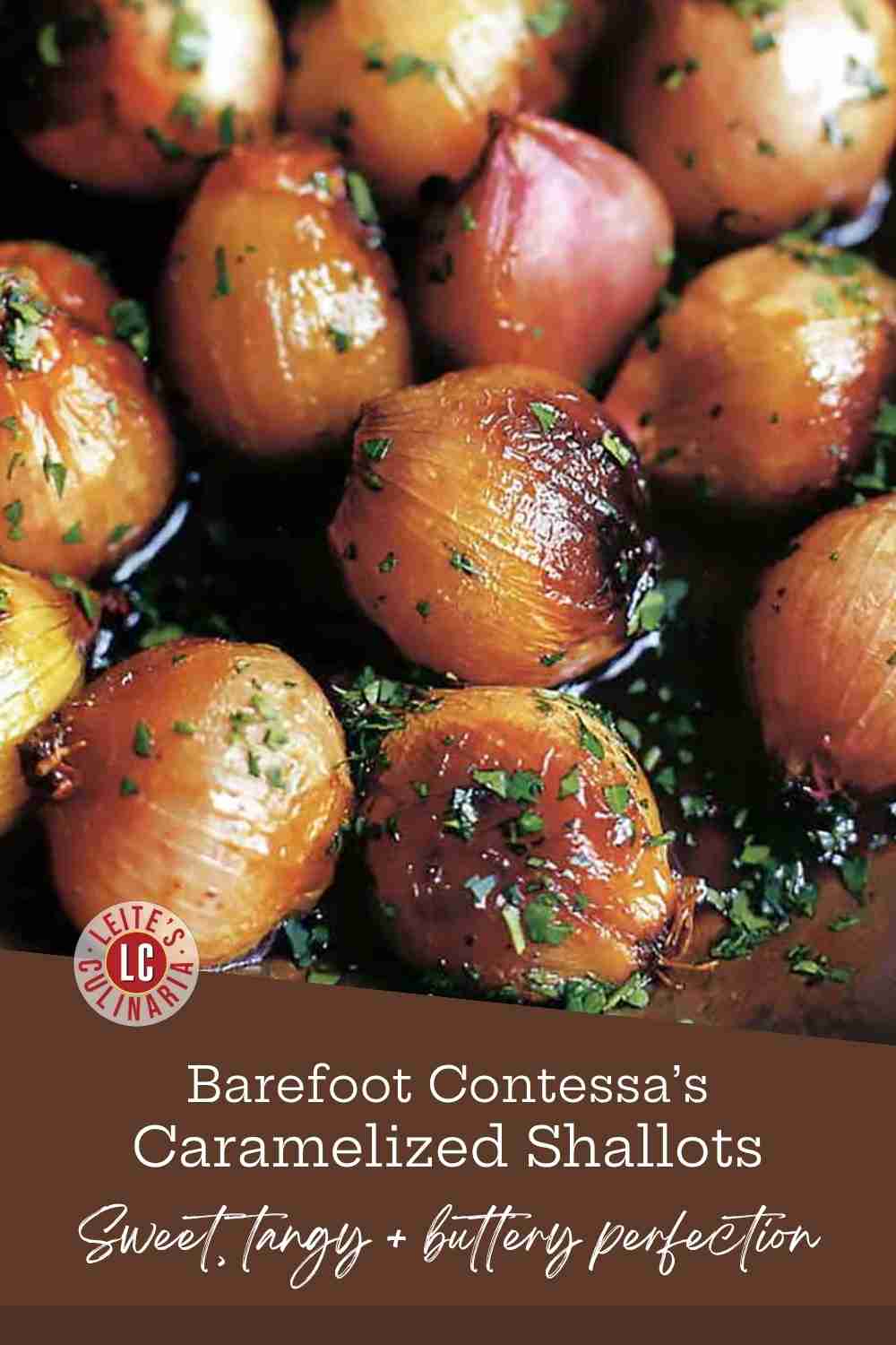 Whole caramelized shallots glistening in a buttery, brown sauce in a skillet, generously sprinkled with chopped fresh parsley.