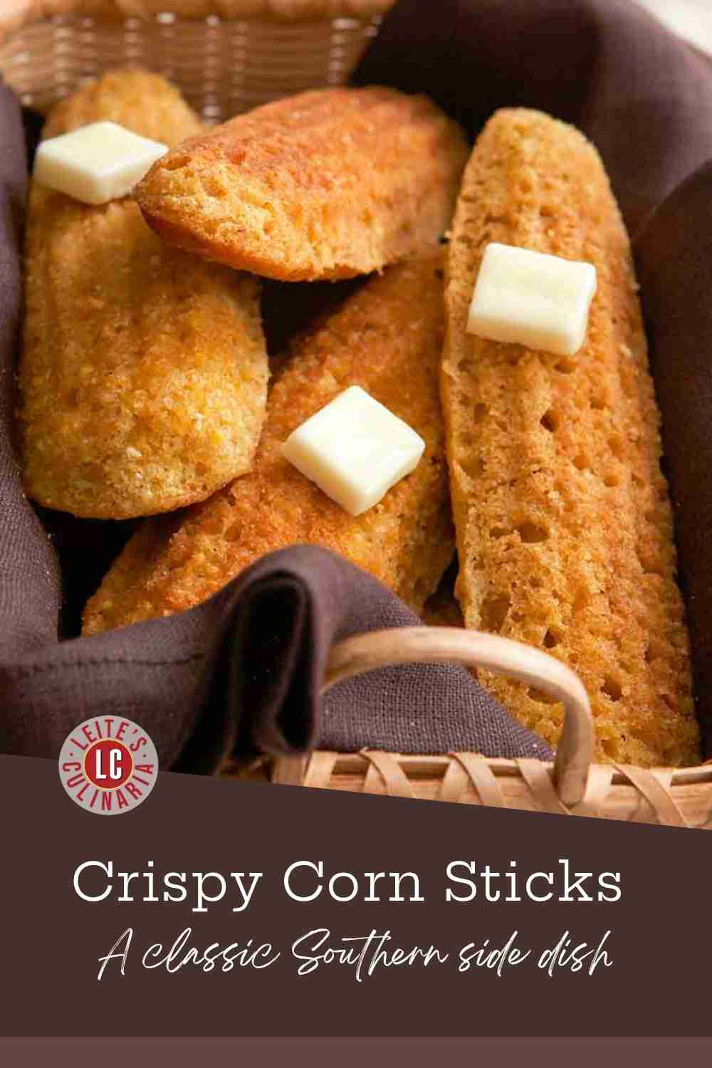 Buttermilk corn sticks, with a crunchy crust, served warm in a woven basket with pats of melting butter on top.