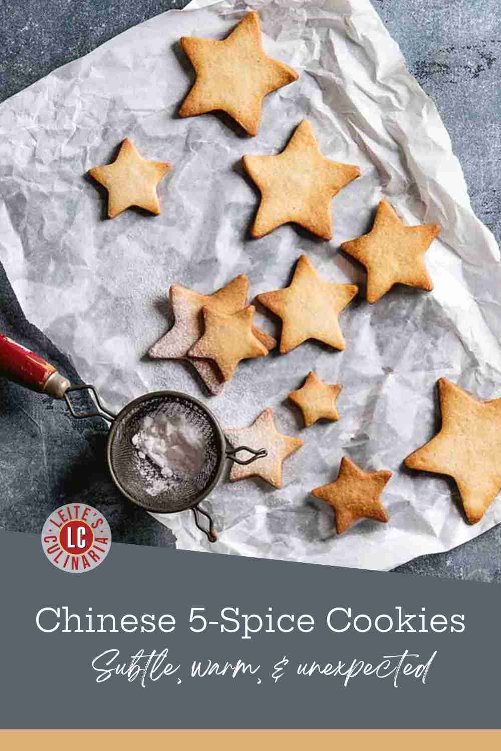Golden-brown star-shaped five-spice cookies dusted with powdered sugar, arranged on wrinkled parchment paper.