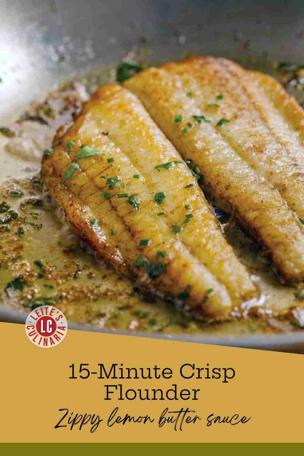 Two golden-brown flounder fillets simmering in a bubbling lemon butter sauce with fresh green herbs in a metal skillet.