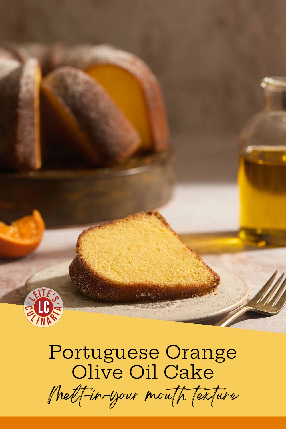 A moist slice of Portuguese orange olive oil cake on a white plate with the sliced cake behind.