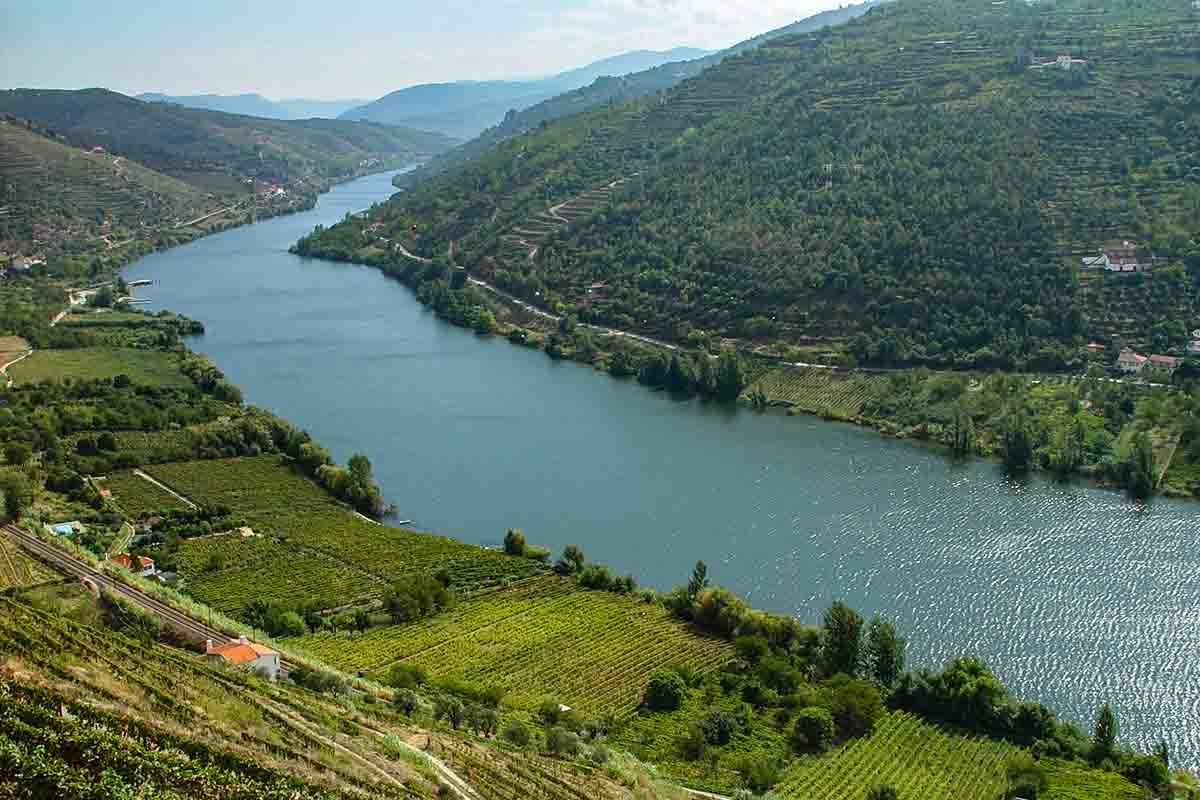 The Douro River cutting though the mountains and vineyards of the Upper Douro Valley.
