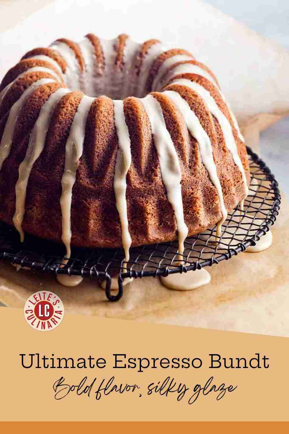 Glazed espresso bundt cake on a wire rack with smooth coffee icing dripping down the golden ridges.