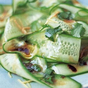 A tangle of Japanese cucumber salad, made with cucumbers, mint, cilantro, and an rice vinegar dressing.