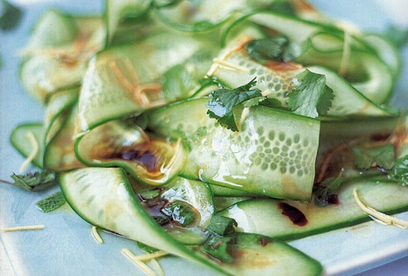 A tangle of Japanese cucumber salad, made with cucumbers, mint, cilantro, and an rice vinegar dressing.