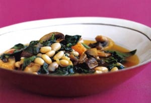 A white bowl filled with quick navy-bean stew.