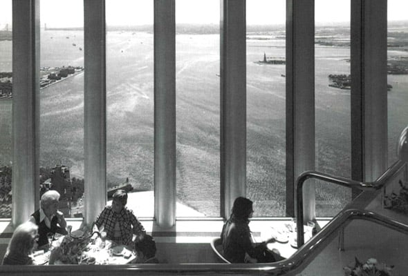 A black and white photo of the dining room at on of New York's finest restaurants, Windows on the World.